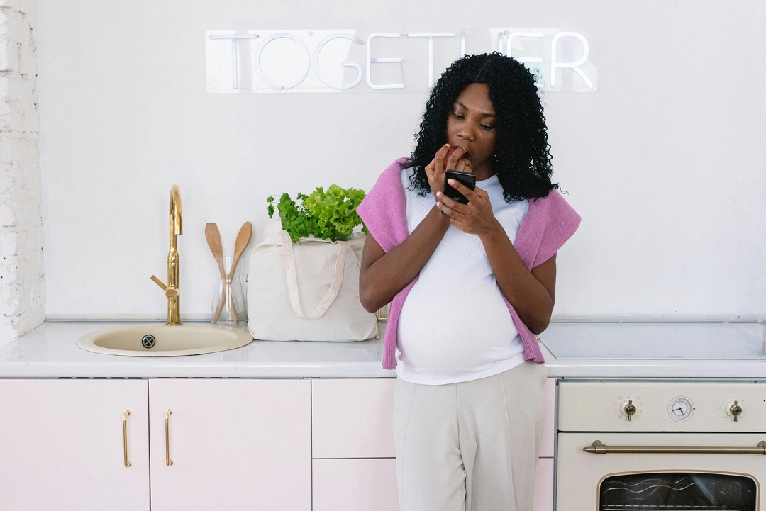 A pregnant woman eating